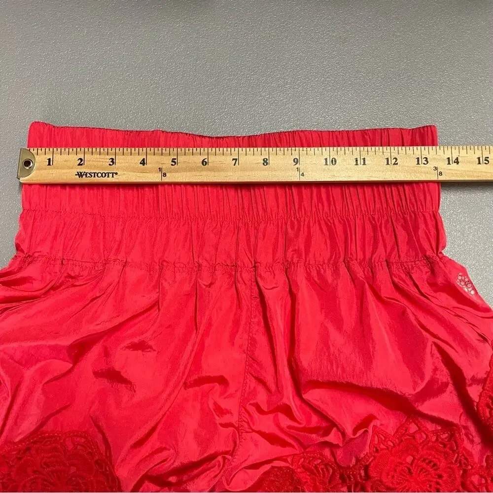 FP Movement Free People neon orange high waisted shorts size Medium